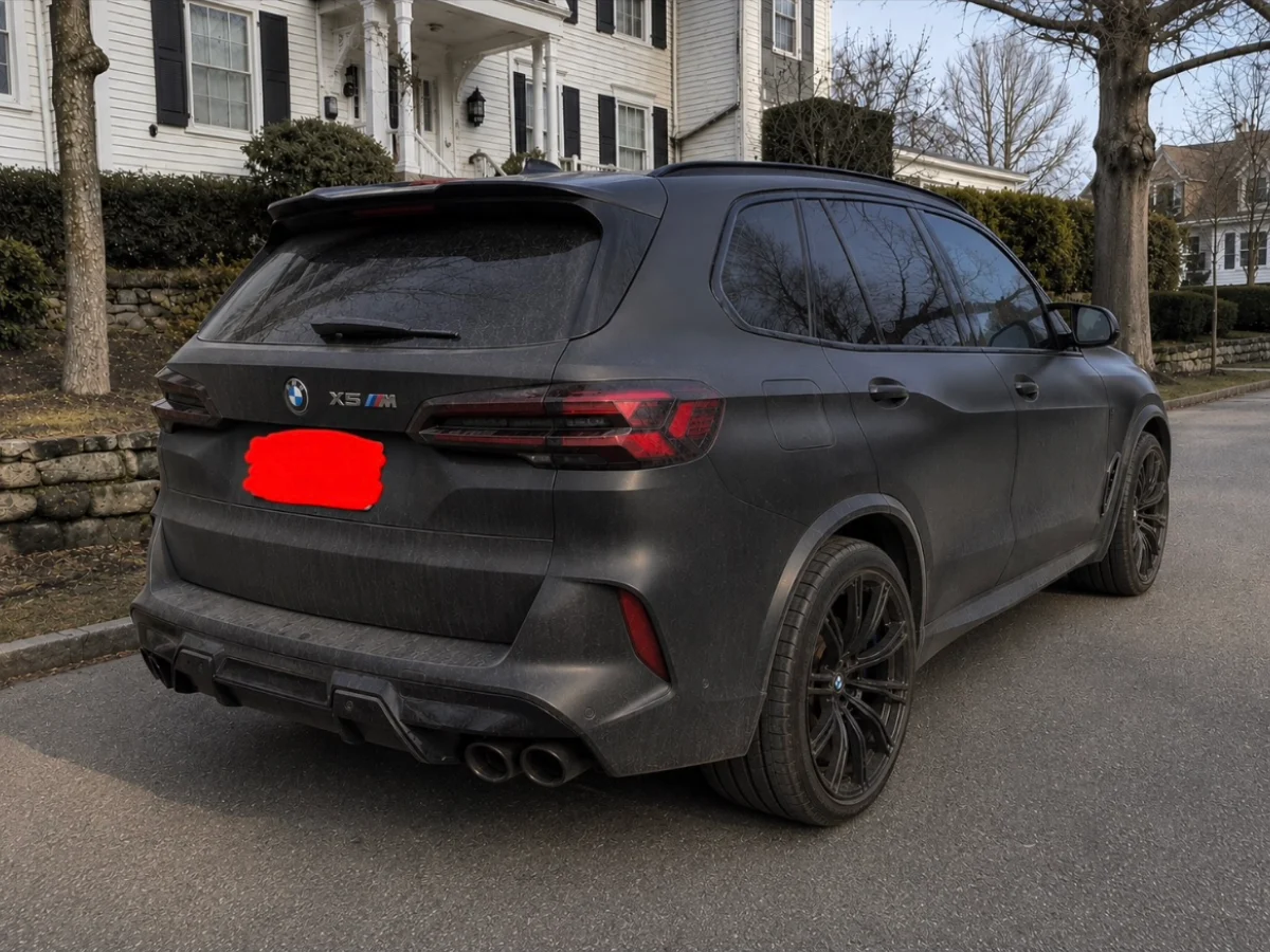The same BMW X5 M before the detail, covered in road dust