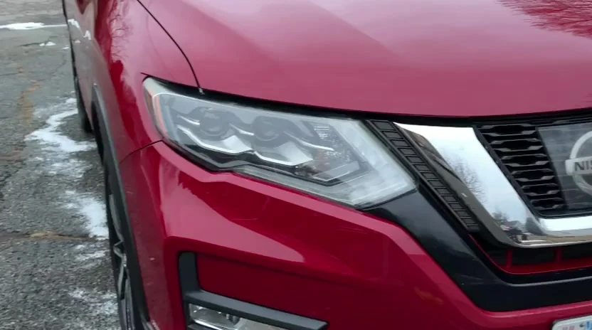 Video of a red Nissan Rogue front end with a clean, glossy finish after detailing, Newton MA